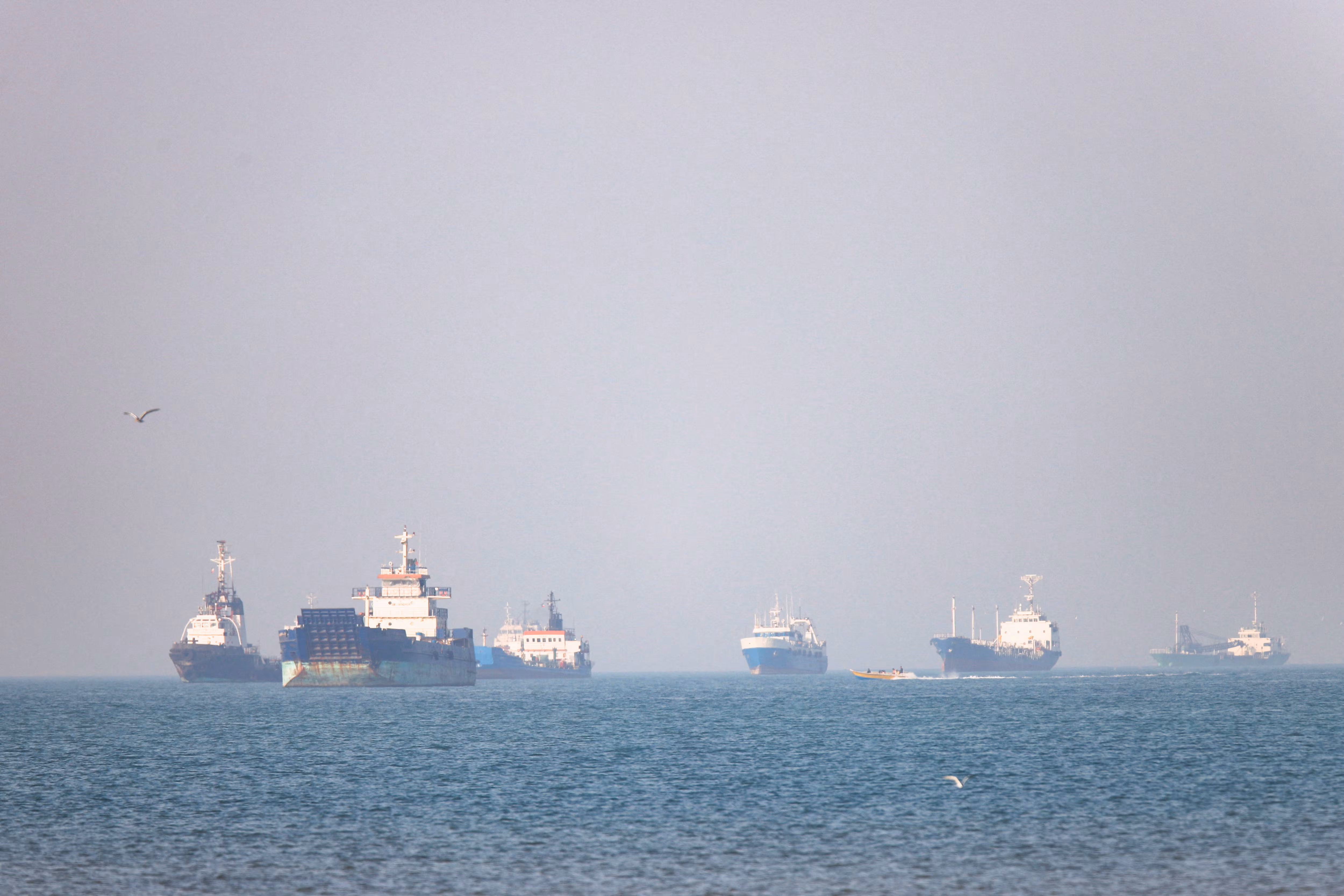 Three vessels struck by unknown projectiles in Strait of Hormuz: UKMTO